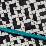 Jean of Fashion Crossword Clue