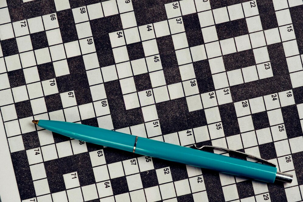 Jean of Fashion Crossword Clue