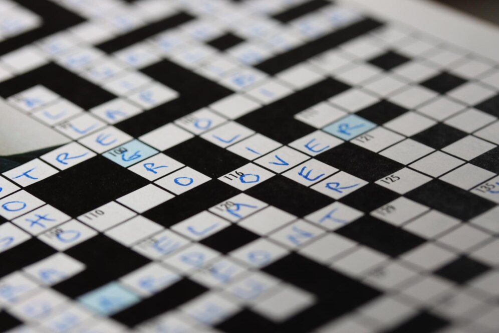 Jean of Fashion Crossword Clue