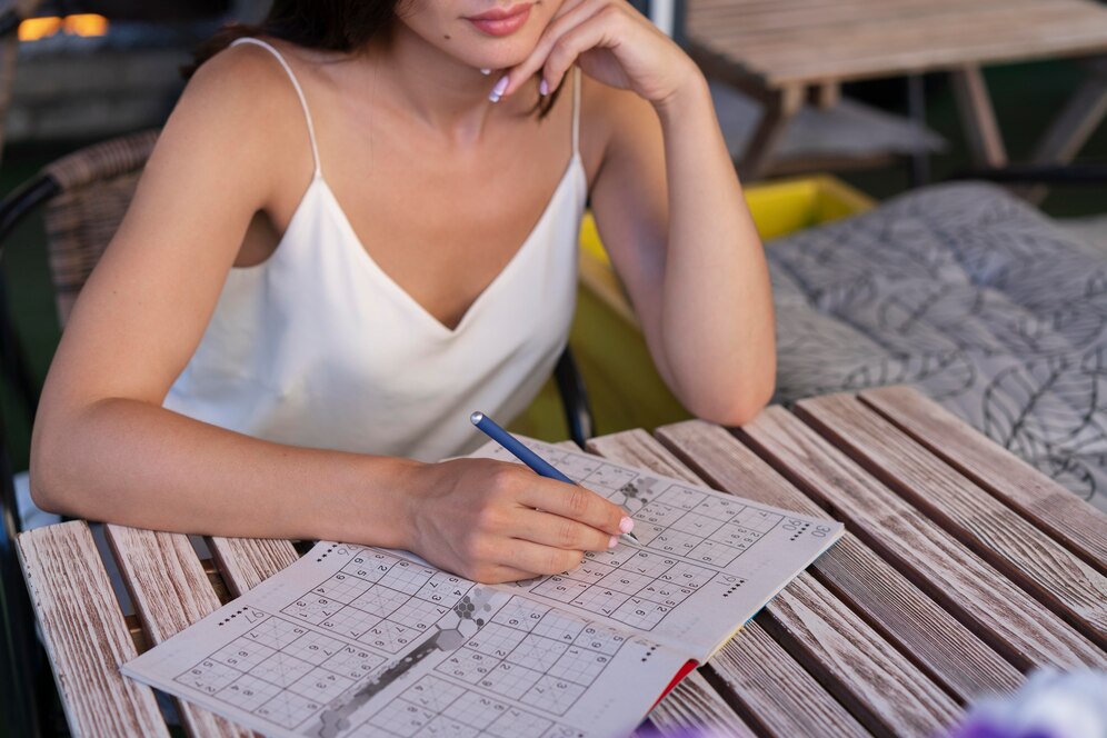 Jean of Fashion Crossword Clue